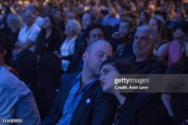 An Israeli couple react after Beresheet spacecraft fails to land safely on the moon on April 11, 2019 in Tel Aviv, Israel. The Israeli spacecraft -...