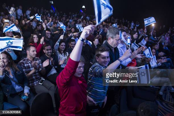 Israelis wave the Israeli flag after Beresheet spacecraft fails to land safely on the moon on April 11, 2019 in Tel Aviv, Israel. The Israeli...