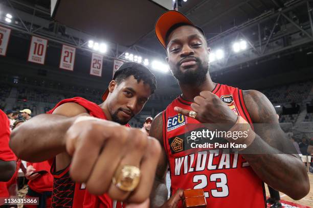 Bryce Cotton and Terrico White of the Wildcats pose with their rings after winning the NBL championship during game 4 of the NBL Grand Final Series...