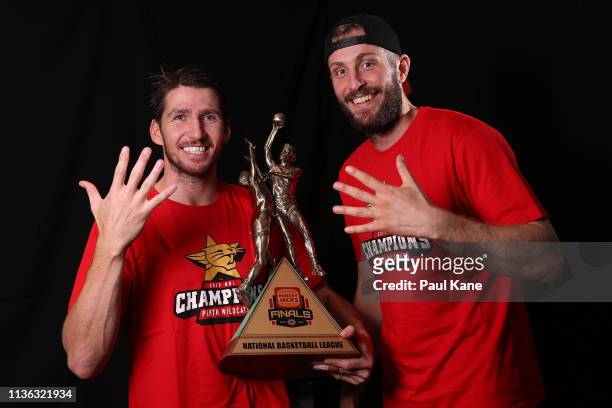 Damian Martin and Jesse Wagstaff of the Wildcats pose with the NBL championship trophy after winning the grand final series during game 4 of the NBL...