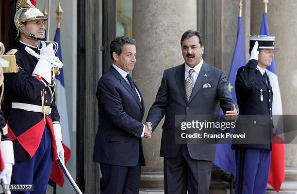 French President Nicolas Sarkozy welcomes Pakistan's Prime Minister Yousuf Raza Gilani at Elysee Palace on May 4, 2011 in Paris, France. After the...