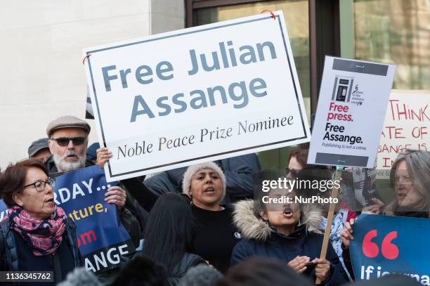 Supporters of Julian Assange gather outside Westminster Magistrates Court where the WikiLeaks founder appears in custody following his arrest on 11...