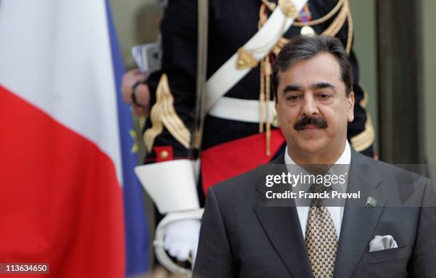 Pakistan's Prime Minister Yousuf Raza Gilani leaves after a meeting with French President Nicolas Sarkozy at Elysee Palace on May 4, 2011 in Paris,...