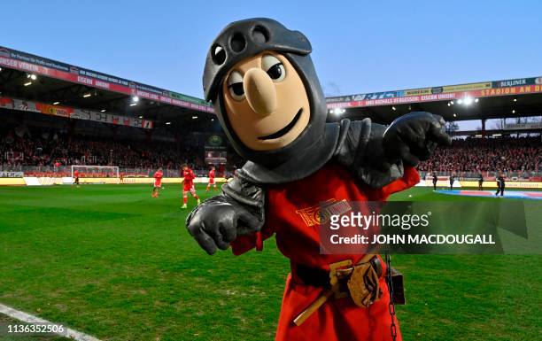 Union Berlin mascot "Ritter Keule" strikes a pose prior to the 2nd division Bundesliga match FC Union Berlin vs FC Ingolstadt 04 at the stadium An...