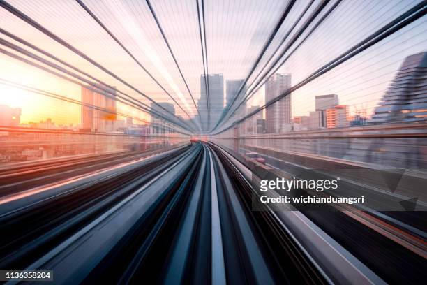 long exposure on tokyo train, japan - on the move stock pictures, royalty-free photos & images