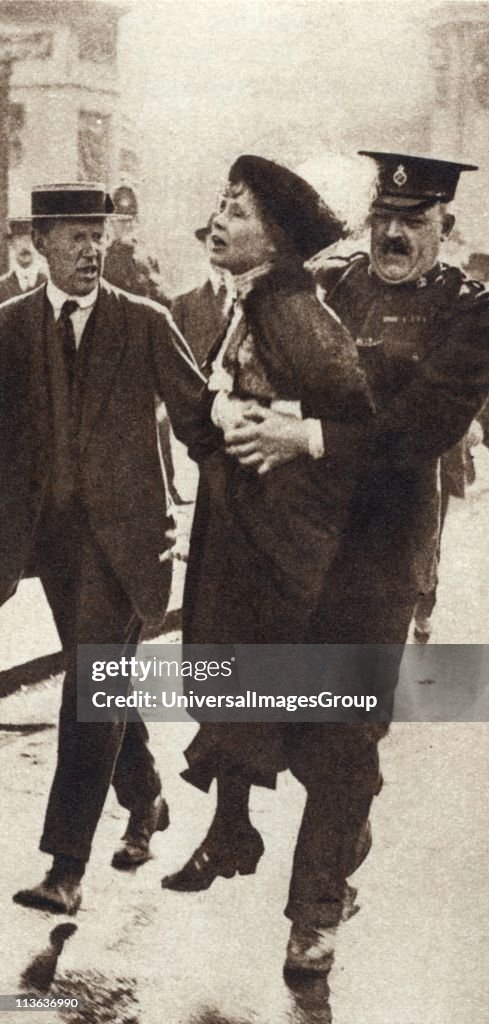 Mrs Emmeline Pankhurst (1857-1928), English suffragette, being arrested outside Buckingham Palace, London 1914...