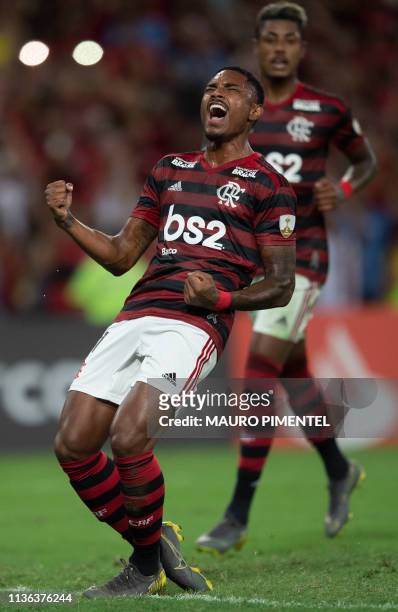 Brazil's Flamengo player Vitinho celebrates after scoring against Bolivia's San Jose during their Copa Libertadores football match at Maracana...