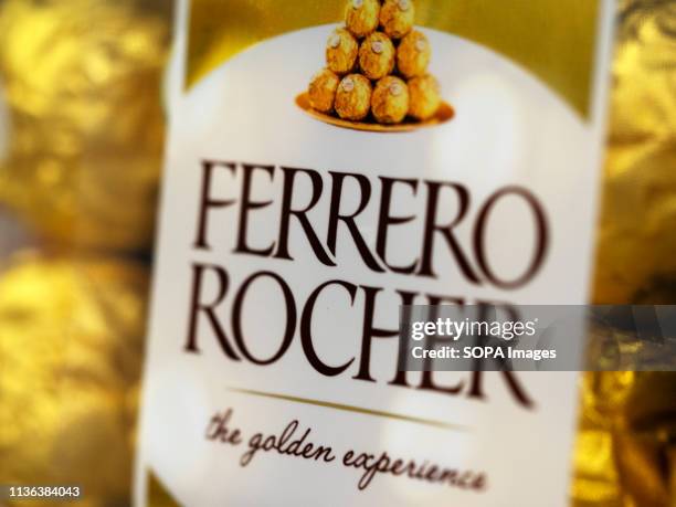 Ferrero Rocher premium chocolate seen at a store shelf, Ferrero Rocher is a spherical chocolate produced by the Italian chocolatier Ferrero SpA.