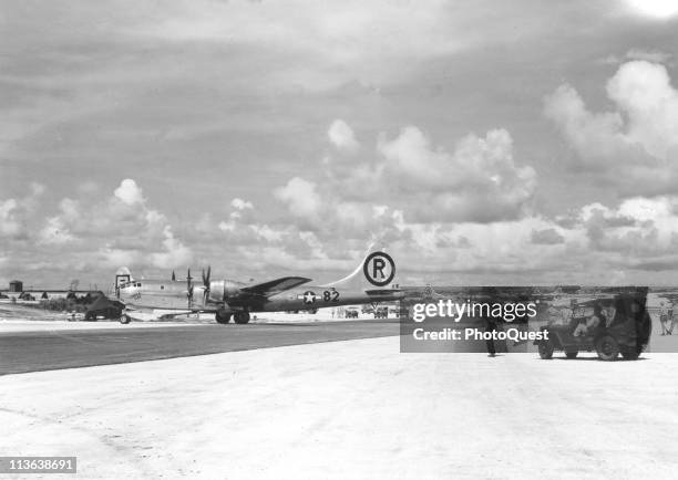 View of the B-29 Superfortress 'Enola Gay,' on its return from the bombing mission over Hiroshima, as it is taxis on the North Field of Tinian...