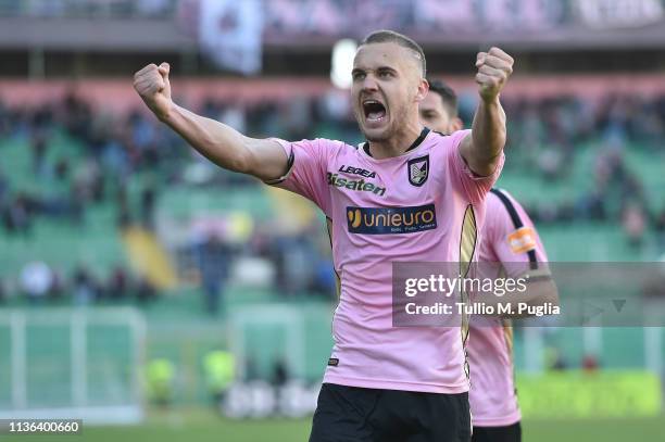 George Puscas of Palermo celebrates after scoring his team third goal during the Serie B match between US Citta di Palermo and Carpi FC at Stadio...