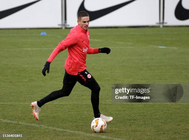 Mijat Gacinovic of Eintracht Frankfurt controls the ball during a training session of Eintracht Frankfurt at Commerzbank Arena on December 11, 2018...