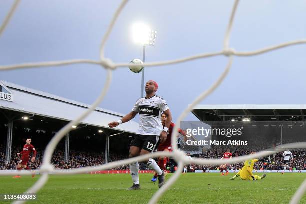 Ryan Babel of Fulham scores his sides first goal during the Premier League match between Fulham FC and Liverpool FC at Craven Cottage on March 17,...