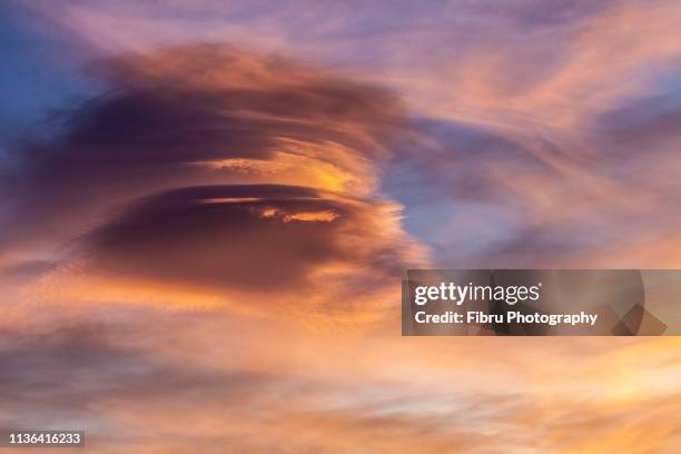 ufo like pattern cloud close-up in the sky - french ufo stock pictures, royalty-free photos & images