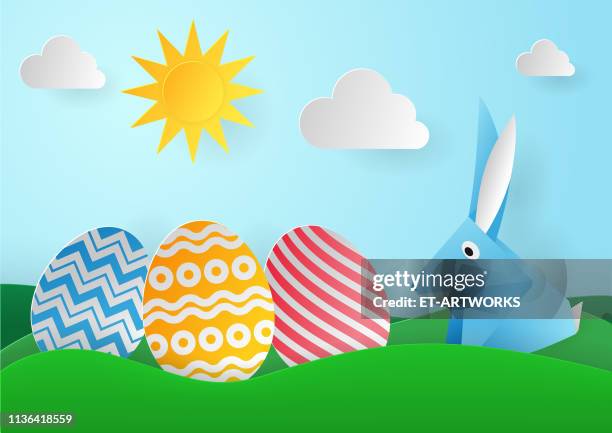 vector easter rabbit with eggs - hare stock illustrations
