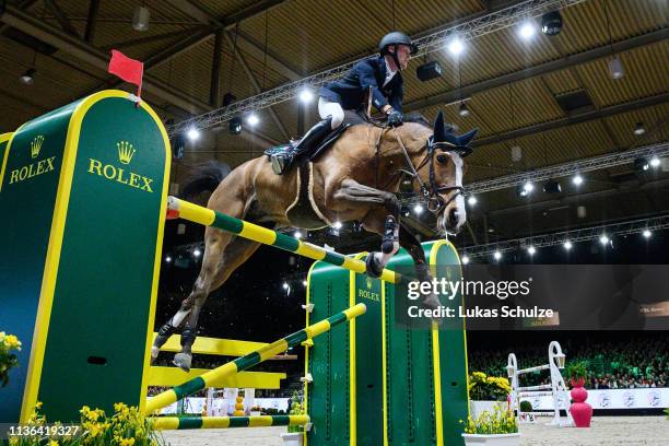 Niels Bruynseels rides Gancia de Muze during the The Dutch Masters: Rolex Grand Slam of Showjumping at Brabanthallen on March 17, 2019 in...