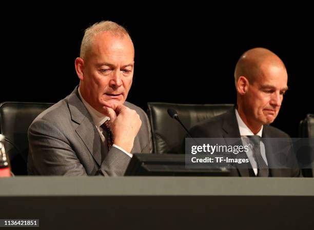 Financial operations guide Thomas Tress sits next to director Carsten Cramer during the Borussia Dortmund General Assembly on November 25, 2018 in...