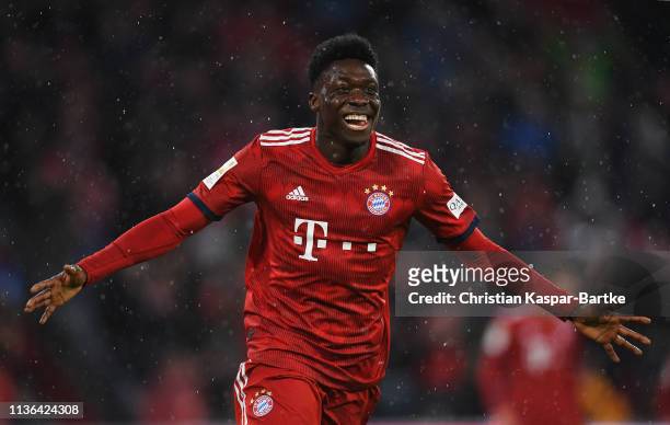 Alphonso Davies of Bayern Munich celebrates scoring his teams sixth goal of the game during the Bundesliga match between FC Bayern Muenchen and 1....