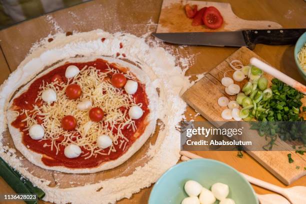 close-up of a vegetarian pizza prepared at home - vegetarian pizza stock pictures, royalty-free photos & images
