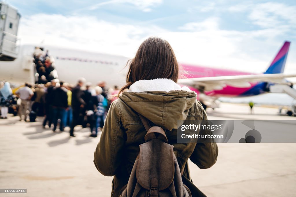 Einsteigen in das Flugzeug