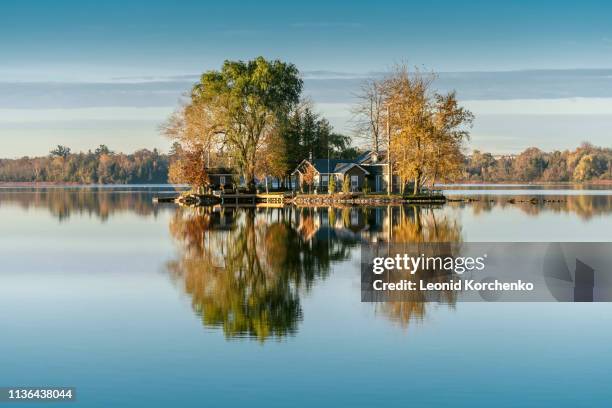small island on puslinch lake, ontario - cottage water stock pictures, royalty-free photos & images