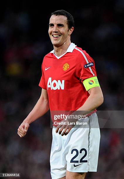 John O'Shea of Manchester United smiles after his team's first goal during the UEFA Champions League Semi Final second leg match between Manchester...