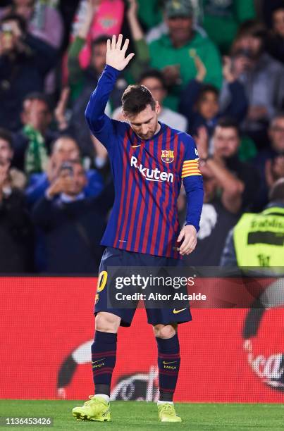 Lionel Messi of FC Barcelona celebrates after scoring his team's fourth goal during the La Liga match between Real Betis Balompie and FC Barcelona at...