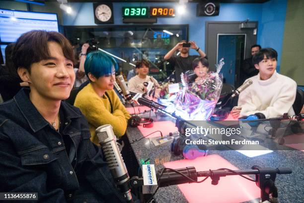 Hope, V, Jungkook, Suga, and Jin of BTS visit The Elvis Duran Z100 Morning Show at Z100 Studio on April 12, 2019 in New York City.