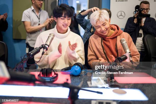 Jin and RM of BTS visit The Elvis Duran Z100 Morning Show at Z100 Studio on April 12, 2019 in New York City.