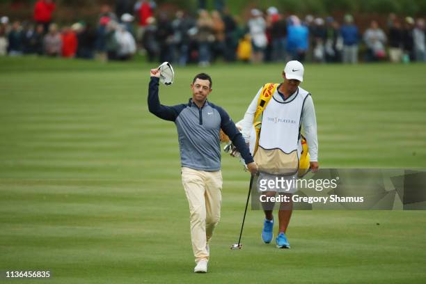 Rory McIlroy of Northern Ireland reacts as he walks to the 18th green during the final round of The PLAYERS Championship on The Stadium Course at TPC...