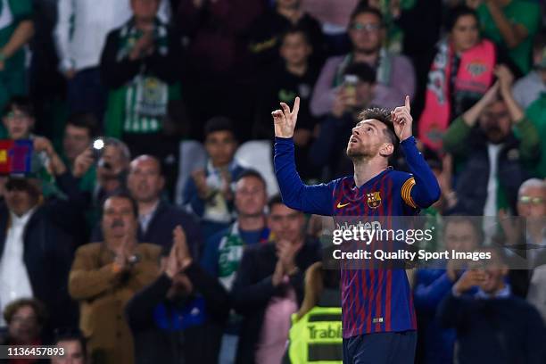 Lionel Messi of FC Barcelona celebrates after scoring his team's fourth goal during the La Liga match between Real Betis Balompie and FC Barcelona at...