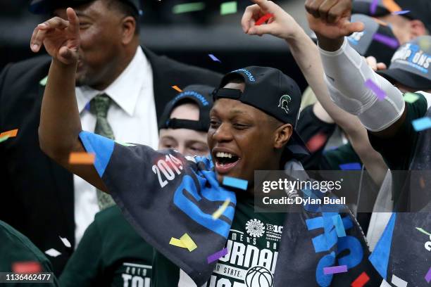 Cassius Winston of the Michigan State Spartans celebrates after beating the Michigan Wolverines 65-60 in the championship game of the Big Ten...