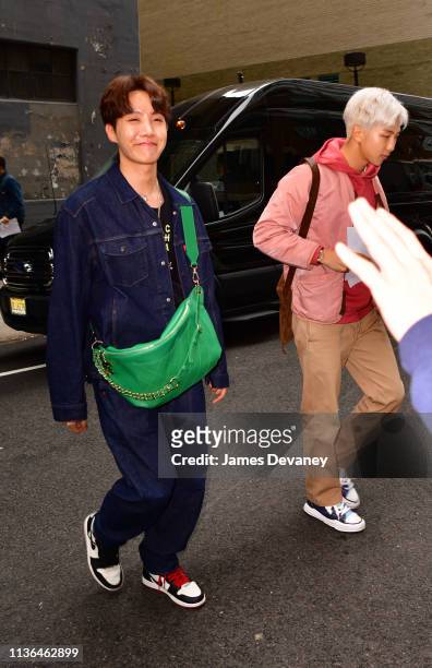 Hope and RM of BTS seen on the streets of Manhattan on April 12, 2019 in New York City.