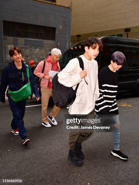 Hope, RM, Jungkook and Suga of BTS seen on the streets of Manhattan on April 12, 2019 in New York City.