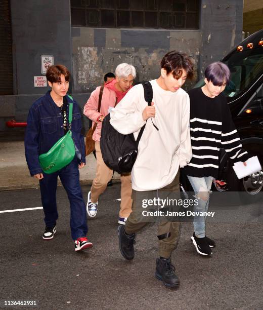 Hope, RM, Jungkook and Suga of BTS seen on the streets of Manhattan on April 12, 2019 in New York City.