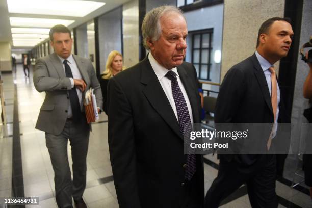 Attorneys Jack Goldberger , Alex Spiro and William Burck, the defense team for New England Patriots owner Robert Kraft, make their way to Courtroom...