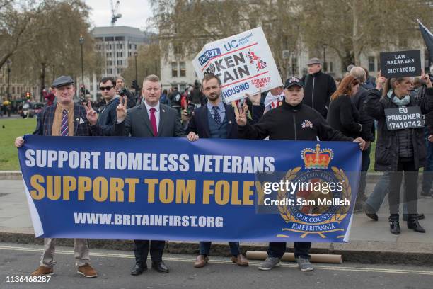 Paul Golding, leader of Britain First political party, with members of Britain First outside Westminster on the 12th April 2019 in London in the...