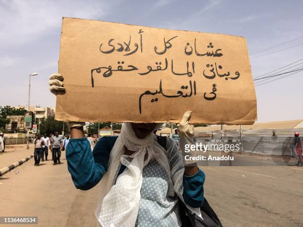 Sudanese protestors gather to march for demanding a civilian transition government, near the central military headquarters in Khartoum, Sudan on...