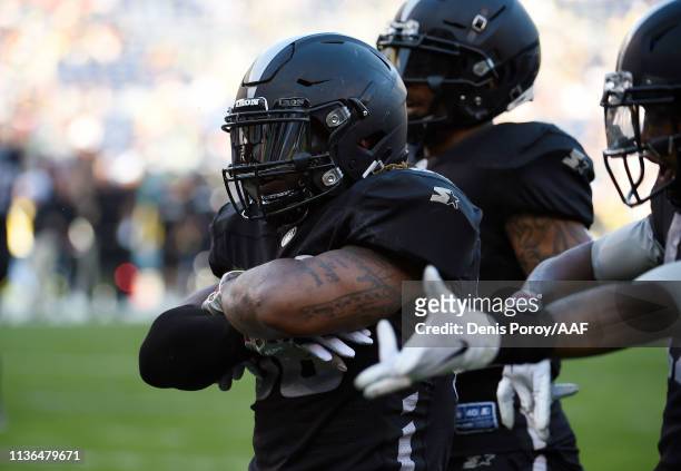 Trent Richardson of the Birmingham Iron celebrates after scoring a touchdown during the first quarter against the San Diego Fleet in an Alliance of...