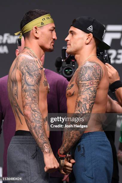 Max Holloway and Dustin Poirier face off during the UFC 236 weigh-in at State Farm Arena on April 12, 2019 in Atlanta, Georgia.