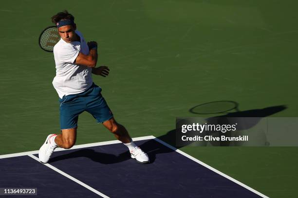 Roger Federer of Switzerland plays a forehand against Dominic Thiem of Austria during their men's singles final on day fourteen of the BNP Paribas...