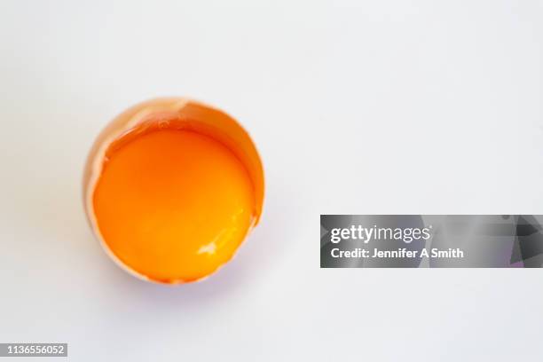 egg yolk - egg yolk stock pictures, royalty-free photos & images