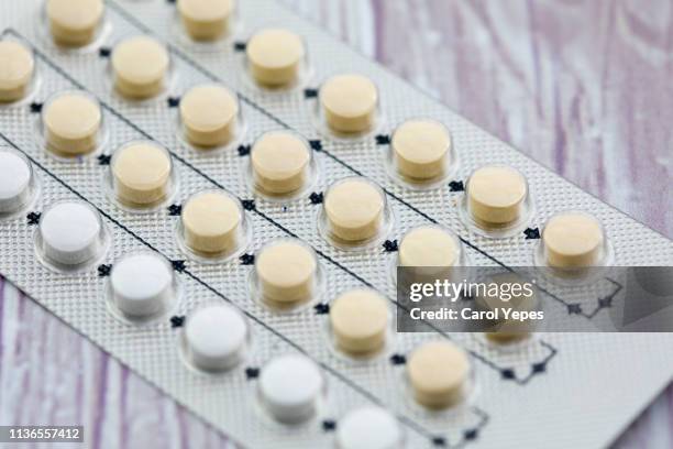 contraceptive pills background - antibabypille stock-fotos und bilder