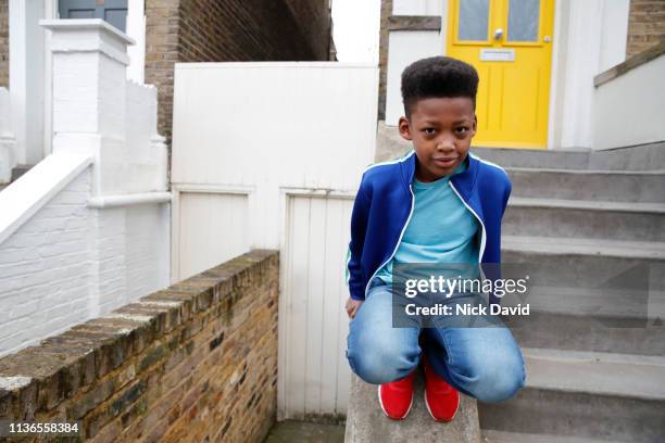 Child Stooping 43 Urban Kids On Stoop Stock Photos, High-Res Pictures, and Images ...