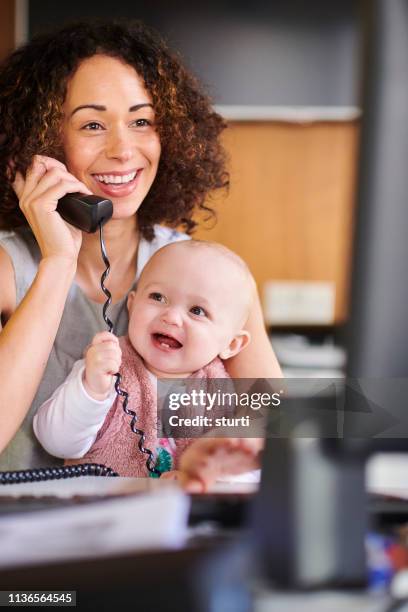 happy workplace - landline phone home stock pictures, royalty-free photos & images