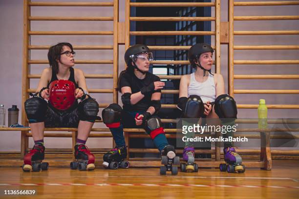 roller derby girls - roller rink stock pictures, royalty-free photos & images