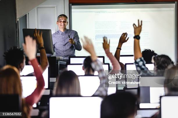 engaging class at computer lab! - classroom technology stock pictures, royalty-free photos & images