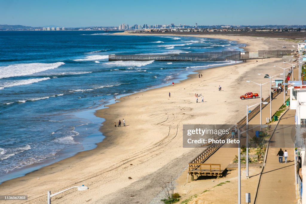The Usmexico Border Wall At Tijuana Beach In Baja California With The ...