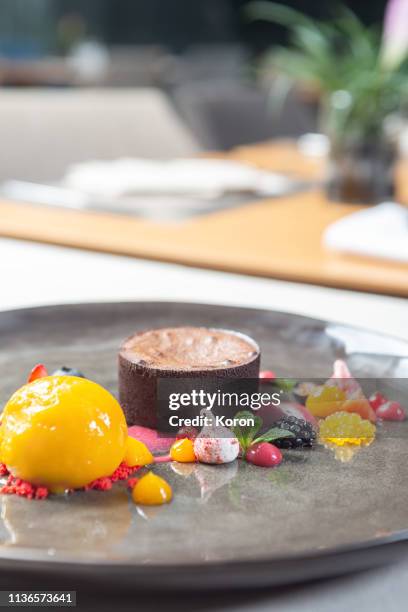 chocolate souffle -haute couture food concept - molecular gastronomy stock-fotos und bilder