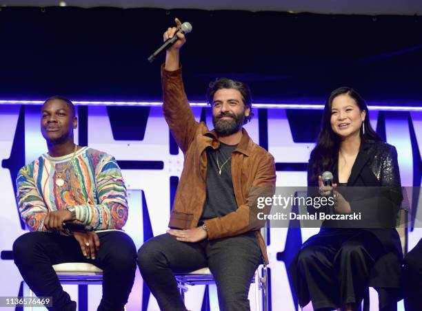 John Boyega , Oscar Isaac and Kelly Marie Tran onstage during "The Rise of Skywalker" panel at the Star Wars Celebration at McCormick Place...