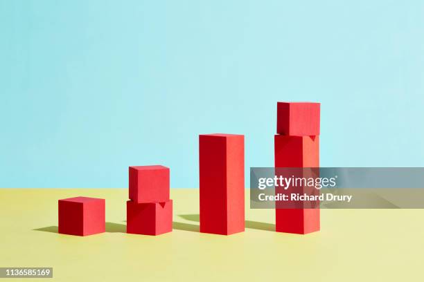 conceptual image of geometric blocks - growth graph stock pictures, royalty-free photos & images